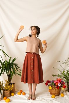 "🌿 DETAILS 🌿 ✳ Functional buttons down the front ✳ Darts around the waist ✳ A-line silhouette 🌿 DESCRIPTION 🌿 Full midi skirts were popular in the 1940s for their grace and elegance. Today, these highly versatile skirts are back in style. A trans-seasonal piece you can wear all year round, this skirt will allow for plenty of styling options and will no doubt become one of your favorite wardrobe staples. It's practical enough for everyday wear. Could be a workwear staple but it is also ideal for casual everyday moments. Say goodbye to all boring midi skirts, your closet deserves this vintage-inspired charm! 🔸Please note that due to the many variations in monitors and browsers, actual colors may vary.🔸 🔸Different colors and sizes are available.🔸 🌿 SIZES & MEASUREMENTS 🌿 The model i Midi Rock Outfit, Linen Midi Skirt, Full Midi Skirt, Retro Skirt, Rock Outfit, Linen Suit, Midi Skirts, Linen Skirt, Skirt Pattern