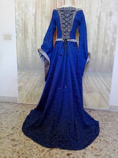 Long Sleeve Victorian Dress For Fantasy Events, Gothic Blue Costume Dress, Medieval Victorian Dress With Long Sleeves For Fantasy Events, Medieval Long Sleeve Dress For Fancy Dress, Medieval Long Sleeve Victorian Dress For Fantasy Events, Blue Gothic Style Dress For Fancy Dress Occasions, Blue Fantasy Dresses For Fantasy Events, Blue Medieval Dress With Long Sleeves, Gothic Long Sleeve Blue Dress