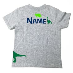 **All Designs shown in our shop or on our site are Registered Copyrights by Shirt Traveler, LLC. This is a perfect Shirt for your toddlers Birthday or just for everyday wear! Let us know what number you would like on front, and what name on back at check out. Contact us if you would like something special and different. We can do anything! :) *4.5 oz., 90% combed ringspun cotton 10% polyester Dino Birthday Shirt, Dino Birthday, Toddler Birthday, Grey T Shirt, Dinosaur Birthday, Custom Tees, Birthday Shirt, Design Show, Gray Tshirt