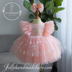 ♥ Introducing our exquisite pink sparkle tulle dress, a perfect blend of elegance and chic style that will make any young girl feel like a princess. This enchanting dress features a delightful bow on top, adding a touch of charm to its overall design. The dress is adorned with butterfly sleeves that gracefully flutter with every movement, enhancing its whimsical appeal. The three-layer tulle skirt creates a voluminous silhouette, while an additional layer of pink sparkle tulle adds a shimmering Elegant Pink Tulle Fairy Dress, Princess Style Tulle Dress With Bow, Pink Tulle Dress With Bow, Pink Tulle Fairy Dress For Party, Elegant Pink Fairy Dress For Party, Princess Style Pink Bow Tutu Dress For Party, Princess Tutu Dress With Pink Bow For Party, Princess Tutu Dress With Bow For Dress-up, Princess Style Party Tutu Dress With Pink Bow