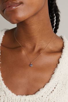 Inspired by the moon, Andrea Fohrman's celestial collections are enchantingly ethereal. This handcrafted 'Mini Cosmo' necklace showcases an Australian opal poised beneath a diamond-encrusted star. It's crafted from 14-karat gold with a long chain that lends itself beautifully to styling with plunging necklines. Fine Jewelry With Sapphire And Single Cut Diamonds, Celestial Diamond Necklace For Gift, Celestial Diamond Necklace Gift, Celestial Style 14k White Gold Necklace, Sapphire Necklaces With Single Cut Diamonds, Sapphire Necklace With Single Cut Diamonds, Celestial 14k Gold Diamond Necklace Gift, Celestial Wedding Necklace In 14k Gold, Celestial 14k Gold Wedding Necklaces