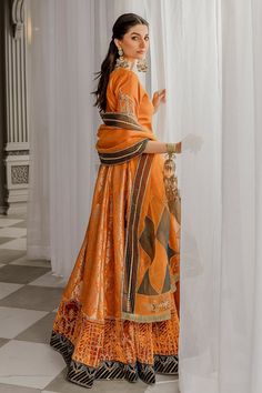 Gold Jamawar Dress For Diwali, Elegant Orange Traditional Wear For Festivals, Orange Banarasi Silk Anarkali Set, Semi-stitched Orange Banarasi Silk Lehenga, Orange Semi-stitched Banarasi Silk Lehenga, Unstitched Orange Silk Lehenga, Orange Chanderi Lehenga With Dupatta, Semi-stitched Orange Salwar Kameez With Zari Work, Unstitched Orange Anarkali Set For Festive Occasions