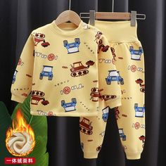 Our Cartoon Long Sleeve Pajama Sets is the perfect addition to your child's sleepwear collection this autumn season! Featuring a cute and playful cartoon design, these pajama sets are sure to make your child smile and feel cozy and comfortable.Made from high-quality materials, these pajama sets are thick, soft, and warm, making them perfect for colder autumn nights. The long sleeve T-shirt tops provide ample coverage and warmth, while the matching pants ensure maximum comfort and ease of movemen Cotton Long Sleeve Cartoon Print Sleepwear, Cotton Long Sleeve Sleepwear With Cartoon Print, Long Sleeve Cotton Sleepwear With Cartoon Print, Cotton Pajama Sets For Winter Pajama Party, Cotton Pajama Party Sets For Winter, Cotton Pajama Sets For Winter Party, Cotton Sets For Pajama Party In Winter, Casual Long Sleeve Character Print Sets, Casual Long Sleeve Sets With Character Print