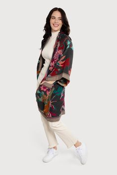 Set the tone for the season with our Floral Cotton Kimono Jacket. Made from 100% cotton, it features a bold, colorful floral pattern for a modern twist on a classic look. Its lightweight fabric makes it great for adding color to your workwear or casual outfits in the warmer seasons. Material: 100% Cotton Length: 31" Width: 46" Sleeve Opening: 28" Grey, Deep Pink, Aqua Made In India Model: 5' 8" Printed Cotton Outerwear For Work, Printed Cotton Workwear Outerwear, Spring Cotton Cardigan With Floral Print, Spring Floral Print Cotton Cardigan, Winter Floral Print Cotton Cardigan, Floral Print Cotton Cardigan For Winter, Spring Floral Print Patterned Outerwear, Casual Cotton Cardigan With Floral Print, Casual Multicolor Floral Print Cardigan