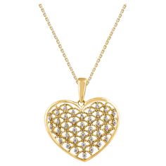 Make any day special with this gorgeous diamond heart pendant. This heart pendant is crafted from 14-karat yellow gold and features 37 single cut diamonds set in prong setting. H-I color I2 clarity and a high polish finish complete the Brilliant sophistication of this head-turning pendant. The total diamond weight 0.15 Carat and this Pendant suspends along with an cable chain. Gold Heart Pendant, Heart Pendant Gold, Heart Pendant Diamond, Gold Heart, Diamond Heart, Heart Of Gold, Cable Chain, White Diamond, Prong Setting