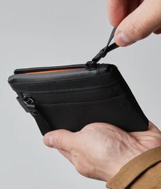 Zip Pouch Black Versatile Card Holder With Coin Pocket For Daily Use, Versatile Rectangular Coin Purse With Rfid Blocking, Versatile Daily Use Card Holder With Coin Pocket, Versatile Rfid Blocking Rectangular Coin Purse, Practical Black Wallet With Card Slots, Practical Black Wallets With Card Slots, Rfid Blocking Travel Wallets In Pouch Shape, Practical Black Wallet For Daily Use, Rfid Blocking Travel Wallet Pouch