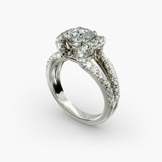 a diamond engagement ring on a white background