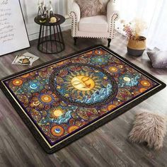 a rug with an image of the sun and moon on it in a living room