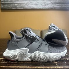 Brand New Without Box Men’s Size 7 Never Been Worn Tags Still Attached Adidas Prophere Men's Running Sneakers Shoes Size 7 Gray Co3023 Custom Running Sneakers With Branded Insole, Adidas Leather Running Shoes, Urban Style Slip-on Custom Sneakers, Adidas Low-top Shoes With Boost Midsole, Adidas Prophere, Shoes Adidas, Shoes Size 7, Grey Adidas, Man Running