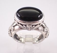 Vintage Sterling Silver Onyx ring. This ring is set with an Oval Black Onyx in the center. This Onyx is genuine and measures 14 X 10 mm. This ring is finger size 6 and weighs 8.4 grams.   This ring will be shipped promptly in a gift pouch. Etched Jewelry, Gift Pouch, Onyx Ring, Rings Statement, Sterling Silber, Black Onyx, Vintage Sterling Silver, Jewelry Gift, Statement Rings