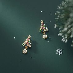 ♡ Elevate Your Holiday Style with Unique Handcrafted Elegance! ♡ ♡ Discover the charm of our 925 Sterling Silver Christmas Tree Stud Earrings, meticulously designed to add a touch of festive magic to your holiday look. ♡ Minimalistic Holiday Spirit: These earrings are a subtle yet stylish way to embrace the joy and spirit of the Christmas season, making them perfect for those who appreciate simplicity in their holiday jewelry. ♡ Xmas-Inspired Jewelry: Capture the essence of Christmas with these stud earrings that celebrate the holiday and all its merriment, including Santa and festive gifts. ♡ Perfect Holiday Gifts: Whether you're treating yourself or looking for a thoughtful present, these earrings make a wonderful holiday gift that will be cherished. ♡ Handcrafted with Care: Each pair of Christmas Presents For Women, Rainbow Gifts, Colourful Christmas, Rainbow Christmas, Silver Christmas Tree, Tree Earrings, Christmas Tree Earrings, Earring Tree, Earrings Crystal