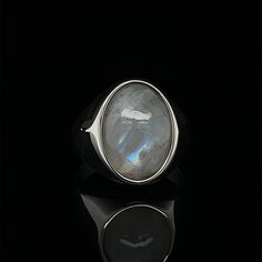 The elegant, smooth-textured Moonstone gemstone is much more than an eye-catching jewelry stone. It is said to have immense healing and spiritual properties.  Those purchasing these pieces will not only have the satisfaction of owning and wearing something special, but also allowing someone to continue creating something that they love. Tim's Silver gives you the meaning and the properties of this gemstone ring. PRODUCT DETAILS Metal : 925k Sterling Silver  Stone : Moonstone ( 13×18 mm ) Style: Minimalist Moonstone Ring For Healing, Healing Minimalist Moonstone Ring, Modern Oval Moonstone Jewelry, Healing Opal Ring With Moonstone, Mystical Moonstone Jewelry With Large Stone, Silver Moonstone Ring For Healing With Moon Phase, Modern Moonstone Ring With Large Stone, Minimalist Oval Moonstone Ring With Natural Stones, Modern Oval Moonstone Ring With Large Stone