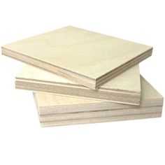 three plywood boards stacked on top of each other, one is white and the other is light brown