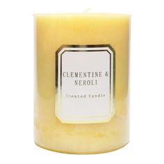 clementine and neroli scented candle with white label on the front, isolated against a white background