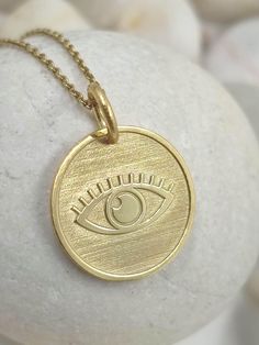 Dainty Evil Eye Necklace, solid gold 14k, Nazar Symbol Pendant, Evil Eye Pendant, Third Eye Necklace, Protection Symbol, necklace for gift.(ask us to do it for you in the size you want). 1.43cm Symbolic 14k Gold Necklace With Coin Pendant, 14k Gold Symbolic Coin Pendant Necklace, 14k Gold Coin Pendant Symbolic Necklace, 14k Gold Amulet Necklace, 14k Gold Coin Pendant Necklace, Symbolic Recycled Gold Jewelry As Gift, 14k Gold Engraved Amulet Charm Necklace, 14k Gold Round Amulet Charm Necklace, 14k Gold Charm Necklace With Coin Pendant For Gift