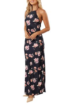 A blooming floral print enhances the romantic feel of a streamlined halter dress that's ready for your next occasion. Back button closure; ties at neck and back Halter neck Lined 100% polyester Hand wash, line dry Imported Halter Neck Floral Print Dress For Party, Fitted Halter Neck Floral Dress, Spring Floral Print Fitted Backless Dress, Floral Print Maxi Halter Dress For Party, Floral Print Maxi Length Halter Dress For Party, Elegant Floral Print Backless Beach Dress, Fitted Floral Print Halter Dress, Fitted Floral Print Backless Dress For Spring, Backless Floral Print Halter Dress For Party