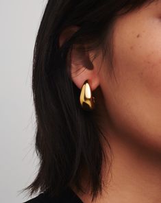 Dome Medium Hoop Earrings | 18k Gold Plated. These Sculptural Medium-Sized Chunky Hoops Feature an Organic-Inspired Domed Design. Handcrafted for Everyday Wear, the Earrings are Super Lightweight and Feature a High-Shine Finish. Pair with Domed Huggies to Create a Scaled Hoop Ear Stack. Metal: 18K Recycled Gold Plating on Brass Dimensions: 25. 8mm X 11. 3mm Weight: 13g Product Code: Dm-G-E5-Ns Medium Hoop Earrings, Ear Stack, Demi Fine Jewelry, Recycled Silver, Monogrammed Items, Gold Price, Recycled Gold, Recycled Sterling Silver, Conflict Free Diamonds