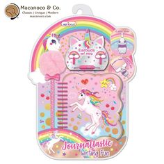 a unicorn notebook and pen set in a pink package with rainbows, stars and clouds