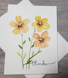 a thank card with watercolor flowers on it