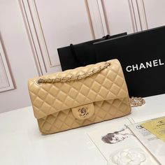 High-end Beige Bag For Gift, Luxury Beige Double Flap Bag, Classic Beige Double Flap Bags, Classic Beige Double Flap Shoulder Bag, Classic Beige Shoulder Bag With Double Flap, Luxury Envelope Shopping Bag, Luxury Beige Double Flap Shoulder Bag, Luxury Envelope Bag For Shopping, High-end Beige Rectangular Flap Bag