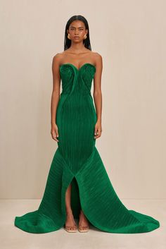 A sculpturally designed plissé strapless gown featuring a exaggerated train and artful bust. — Sculpted plissé fabric — Rose bud shaped bust details — Exaggerated train — Mermaid tail hem Fashion Couture, Rose Bud, Strapless Gown, Cult Gaia, Gala Dresses, Mermaid Tail, Fabulous Fashion, Red Carpet Looks, Spring 2024