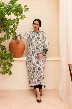 BATIK Zahviya 2Pc - Printed Lawn Dress Ready to wear 2pc dress Flaunt this artfully printed set made from our premium quality Pima lawn in the shades of pearl white. Elegantly printed paneled shirt comes with an embellished neckline - details include lace finishing at neckline and hem. Sleeves are loose fit, adorned with contrasting printed border – finished with lace. Paired with dyed cambric trousers. Disclaimer: Colors may slightly vary due to lighting Premium quality Pima lawn Embellished ne Neckline Details, Embellished Neckline, Lawn Dress, Wedding Branding, Traditional Wear, Pakistani Outfits, Formal Wedding, Exquisite Design, Pearl White