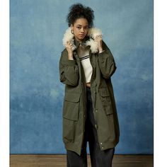 Green Fall Parka For Workwear, Casual Long Coat With Faux Fur Trim, Green Winter Parka For Workwear, Khaki Parka For Fall Workwear, Green Winter Workwear Parka, Trendy Winter Utility Jacket For Cold Weather, Khaki Workwear Parka For Fall, Casual Outerwear With Faux Fur Lining For Work, Casual Workwear Outerwear With Faux Fur Lining