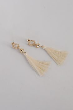 The Gracelyn Gold Tassel Earrings are the hit of the party! These trendy earrings start with a stud post back and have a tassel detail. Add these fun earrings to a black dress + heels to add a chic touch to your date night look! Gold Plated Tassels Stud Post Back One Size | Length 3” Elegant Beaded Tassel Earrings, Chic Tassel Earrings For Evening, Elegant Summer Tassel Earrings, Trendy Tassel Drop Earrings For Evening, Elegant Tassel Drop Earrings For Summer, Elegant Gold Tassel Earrings For Summer, Elegant Summer Tassel Drop Earrings, Elegant Summer Tassel Earrings For Party, Chic Dangle Tassel Earrings For Pierced Ears