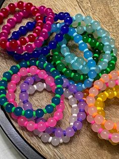 10mm glass beads in vibrant fun candy colors. Paired with flat clay spacers. One size fits wrists from 6 -7.25 inches. Beads Bracelet Ideas, Candy Bracelets, Glass Beads Bracelet, Clay Bracelets, Bracelets Ideas, Beaded Necklace Diy, Clay Bracelet, Best Candy, Necklace Diy