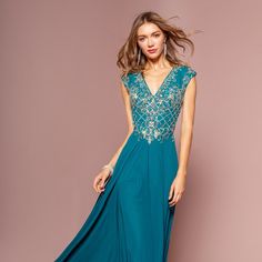 The Elegant Dress Made Of Chiffon Has A Delicate Top Decorated With Sparkling Rhinestones That Create An Eye-Catching Image. The Cutout Back Makes The Look Unique, While The Inconspicuous Zipper On The Back Will Ensure A Secure Fixation Of The Dress. Fabric: Chiffon Length: Long Colour: Teal Neckline: V-Neck Silhouette: A-Line Sleeve: Sleeveless Back: Cut-Out Skirt: Zipper Embellishments: Rhinestones Occasion: Romantic Date/Evening/Dinner, Wedding/Bridesmaid, Graduation, Fashion Show, Visiting T Glamorous Chiffon V-neck Dress, Blue Embellished Chiffon Dress, Elegant Turquoise Floor-length Evening Dress, Graduation Fashion, Blue Embellished V-neck Evening Dress, Blue Embellished V-neck Maxi Dress, Blue V-neck Embellished Sequin Dress, Turquoise V-neck Casual Maxi Dress, Evening Dinner