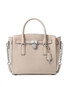 Classic details like chain-links and iconic charms brighten the sturdy frame of a well-organized MICHAEL Michael Kors satchel in rich leather.14-1/4"W x 10-1/2"H x 6"DInterior features 1 zip pocket, 5 slip pockets and key clip4-1/4"L double handles; 18-1/2" to 21-1/4"L adjustable strapZip closureExterior features gleaming hardwareLeather; lining: polyesterColor: Cement Luxury Workwear Satchel With Silver-tone Hardware, Cheap Gray Satchel With Multiple Compartments, Luxury Business Satchel With Silver-tone Hardware, Cheap Formal Satchel With Silver-tone Hardware, Cheap Trendy Satchel With Silver-tone Hardware, Cheap Brown Satchel With Silver-tone Hardware, Luxury Everyday Satchel With Silver-tone Hardware, Luxury Michael Kors Satchel With Silver-tone Hardware, Luxury Satchel With Silver-tone Hardware For Work