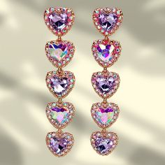 Purple Heart Rhinestone Drop Earrings. Earring Type: Drop Earrings Size: 9cm Long, 1.5 Cm Wide Material: Zinc Alloy Purple Heart-shaped Jewelry For Party, Heart Shaped Purple Jewelry For Party, Heart-shaped Purple Jewelry For Party, Purple Crystal Earrings With Rhinestones, Purple Crystal Rhinestone Earrings, Purple Earrings For Valentine's Day Party, Purple Sparkling Crystal Earrings For Parties, Glamorous Heart-shaped Crystal Earrings, Glamorous Crystal Earrings For Valentine's Day