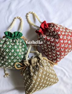 Beautiful designer handmade potli bags that go well with any Indian wear like saris, lehengas, anarkalis, suits  etc. Hand embroidered with white sequin and pearl, and gold kad-dana work. The embroidery is only at the front. The back is a plain solid color.   SHIPPING DETAILS  Our shop is based in India. We ship domestically as well as internationally. For international orders, free shipping is available via India Post and it takes about 15-20 business days to deliver. Faster shipping is available for 25 USD via Speed post and it will take about a week to deliver.  For domestic orders, shipping is free. And once an item is dispatched, it will take about a week to deliver.  DISCLAIMER  The actual color of the product might slightly differ from the image due to photographic lighting or monit Handmade Pouch Bag For Navratri, Handmade Bags For Navratri, Handmade Multicolor Shoulder Bag For Weddings, Traditional Pouch With Dori Work, Traditional Shoulder Bag With Latkans For Parties, Navratri Party Pouch Bags, Gift Bags With Dori Work, Handmade Rectangular Festive Bags, Festive Handmade Rectangular Bag