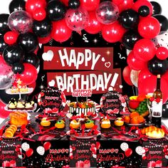 a birthday party with black and red balloons