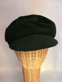 This hat is made using 100% cotton corduroy and is completely lined with cotton batik. It is adjustable to fit most size heads and is machine washable. While this is not a typical Greekfisherman cap it is in the style of one. It can be worn as shown in the first three pictures. Some like to wear it as a flat cap or as a slouchy. The corduroy I use is a very soft fabric and drapes nicely. The bill is soft but sturdy and the hat can be folded into a pocket or a purse. Like all my caps the adjustment is fashioned with a cord and cord stopper. It will fit a wide range of sizes but message me if your head is very small or large. I can adjust to fit. Greek Fisherman Hat, Port Townsend, Fisherman Hat, Newsboy Cap, Flat Cap, Batik Fabric, The Bill, Ear Warmers, Batik