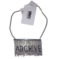 Mm6 Margiela "Archive" Printed Text Chain Necklace. Original Tags And Dust Bag. Photographed With And Without Flash, Check Photos Carefully Before Purchasing. #Margiella #Blessberlin #Viviennewestwood #Commesdesgarcons Luxury Silver Chain Necklace For Evening, Modern Party Necklaces With Chain Strap, Silver Box Chain Necklace For Party, Modern Silver Chain Necklace For Party, Silver Necklace With Chain Strap For Evening, Margiela Archive, Cork Necklace, M Necklace, Neutral Eyeshadow Palette