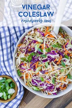 a bowl filled with coleslaw and carrots next to a small bowl of peas