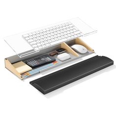 a keyboard, mouse and other items in a drawer with the lid open to show it's contents