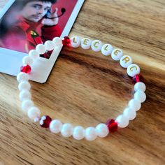 For the love of Charles! Do you love Charles Leclerc like I do? This is a pearl themed bracelet. I can personalize it to anything you like though. Inchident, Charles, Ferrari, etc. This friendship bracelet is for you. Lol. A subtle but fun nod to the fandom. (Polaroid not included.) This bracelet is hand made with faux pearls and glass beads. They are handmade so each one is different based on the beads. The bracelet itself measures approximately 7 inches around. If you would like it sized differently, please let me know. Charles Ferrari, Bead Friendship Bracelet, Charles Leclerc Ferrari, Leclerc Ferrari, Friendship Bracelets With Beads, Charles Leclerc, Handmade Beads, Handmade Accessories, Friendship Bracelet