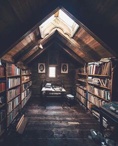 an attic with bookshelves full of books