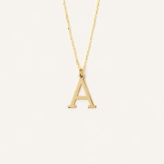 The Personalized Dainty Initial Pendant Necklace in 14K Gold is a stylish and elegant accessory that adds a touch of personalization to any outfit. Made from high-quality 14K gold, this custom necklace features a dainty pendant with a single initial of your choice. The letter pendant hangs from a dainty 14k gold chain. Perfect for gifting, this necklace is a timeless piece that can be worn for any occasion. 14k solid gold handcrafted necklace 100% ethical sourced jewelry Material: 14k Solid Gold Yellow Gold Initial Pendant Charm Necklace Stamped 14k, 14k Gold Name Necklace With Initial Pendant, Gold Polished 14k Gold Initial Necklace, Classic Gold Initial Necklace For Formal Occasions, Yellow Gold Initial Necklace With Polished Finish, Classic Yellow Gold Initial Necklace For Anniversary, Classic Yellow Gold Initial Necklace, Elegant Pendant Initial Necklace Tarnish Resistant, Classic Initial Pendant Necklace With Polished Finish