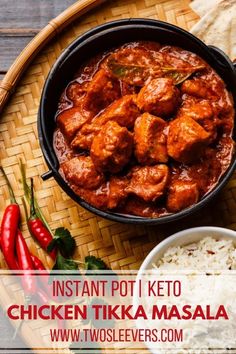 chicken tikka masala in a bowl with rice and red peppers on the side