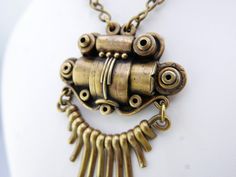 "Unusual vintage 1970s necklace! Somewhere between Brutalist, Steampunk, Art Deco, and modernist. Very well made, I wish I knew who the artist is. Chain measures 23 1/2\" - Pendant is 3 3/4\" x 2 1/4.\" Condition - excellent, no damage or repairs." Retro Metal Necklaces For Jewelry Making, Retro Soldered Metal Jewelry, Retro Metal Pendant Necklace, Retro Pendant Metal Necklace, Retro Metal Necklaces With Large Pendant, Retro Metal Necklace With Large Pendant, 1970s Necklace, Modernist Ring, Purple Jade