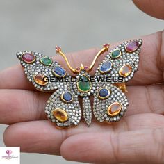 Multi-Gemstone Brooch, Butterfly Brooch Pin, Pave Diamond Brooch, Gemstone Silver Brooch, 925 Silver Jewelry, Butterfly Brooch Pendant, Gift Gross Weight: 13.94 gram Gemstone Weight: 6.37 cts Diamond Weight: 3.10 cts Brooch Size: 35X28 MM NOTE:- All The Products Are Designed And Manufactured In My Workshop By Me & My Team. Shown Products Are Purely Handmade. Custom Orders Are Open Handly Accepted. We Are the Perfect Choice For Any Custom Jewelry Manufacturing. For Bulk Orders Please Message Fine Jewelry Diamond Multi-stone Brooches, Fine Jewelry Diamond Multi-stone Brooch, Multi-stone Diamond Brooches, Diamond Multi-stone Brooches In Fine Jewelry Style, Fine Jewelry Multi-stone Brooches As Gift, Fine Jewelry Multi-stone Brooches For Gift, Diamond Multi-stone Brooches As Gift, Multicolor Brooch Jewelry For Anniversary, Unique Diamond Brooch For Gift