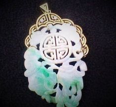 "Grade A Icy Jadeite Green Jade Carved Peach Diamond Antique Pendant 3\" Solid 14k Yellow Gold, 2 Small Diamonds-33.4 grams, 165 Ct This is a large 3 inch x 2 inch (65mm long) pendant! Antique,  Grade A Jadeite Green Jade Hand-Carved Peach Diamond Pendant Solid 14k Yellow Gold and 2 Small Diamonds.   Weight: 33.4 grams, 165 Ct This piece of heirloom jadeite comes with 17\" 10kt gold necklace and a silk necklace holder." Traditional Jade Medallion Jewelry, Traditional Carved Jade Jewelry, Luxury White Jade Jewelry, White Carved Jade Jewelry, Collectible Jade Pendant Jewelry, Carved White Jade Jewelry, White Amulet Style Collectible Jewelry, Traditional White Collectible Jewelry, Antique Carved White Jewelry