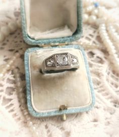 Beautiful Antique French Silver and Clear Stones Ring, Art Deco Three Stones Ring, Gift for Woman or Man Size:  US - 7,5 UK - P France - 56 Diameter inside - approx. 17,9mm / 0,70" Decorative part - width 8,5-6,5mm / 0,33" - 0,25" , length 17,5mm / 0,69", height in the middle - 4mm / 0,16" Stones - 6mm / 0,23" big one in the middle, 4mm / 0,15" smaller ones Width of the band on the bottom of the ring - approx. 3mm / 0,12" Weight - 5,16g Beautiful ring, elegant and sophisticated, in a great antiq Antique Three Stone Diamond Ring For Formal Occasions, Antique Three Stone Round Diamond Ring, Antique Three-stone Diamond Rings, Antique Three Stone Diamond Ring, Antique Three Stone Platinum Rings, Antique Platinum Three Stone Diamond Ring, Antique Platinum Three Stone Rings, Antique Three Stone Round Rings, Antique Platinum Three-stone Jewelry