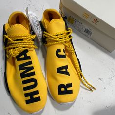 Pharrell Williams Human Race Yellow Sneaker. New In Box. Never Worn. Release Date 7/22/2016 Yellow Adidas Lace-up Sneakers, Yellow Adidas Sneakers Sporty Style, Yellow Adidas Sporty Sneakers, Yellow Lace-up Adidas Sneakers, Yellow Adidas Sneakers With Round Toe, Yellow Athleisure Sneakers With Laces, Yellow Sneakers For Streetwear Athleisure, Yellow Sneakers For Streetwear In Athleisure Style, Yellow Athleisure Sneakers For Streetwear