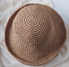 Folding Straw Hat, Wide Brim Floppy Summer Woman Seaside Beach Sun Hat These simple women's summer straw hat are made from  raffia straw. Size: Adjustable 54-58cm (suitable for head circumference 21,25"-22,83") For the perfect holiday , beach, summer, photo session look, travel and other outdoor activities. It is packable, easy to cary. you can fold it and put it into your bag. Please bear in mind that photo may slightly different from actual item in terms of color due to the lighting during pho Lightweight Brown Bucket Hat For Summer, Beige Woven Bucket Hat For Vacation, Brown Lightweight Summer Bucket Hat, Beachy Beige Bucket Hat For Vacation, Natural Flat Brim Bucket Hat For The Beach, Beige Woven Bucket Hat For Beach Season, Beige Woven Bucket Hat For Beach, Brown Bohemian Bucket Hat For Summer, Bohemian Brown Bucket Hat For Vacation