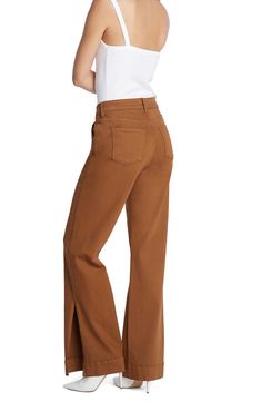 These slouchy high-waist jeans are designed with pronounced seams and wide vented hems. 32" inseam 95% cotton, 4% polyester Machine wash, tumble dry Imported Spring Jeans With Seam Detailing And Tapered Leg, High-waisted Cotton Flare Jeans For Fall, Cotton High-waisted Flare Jeans For Fall, High Rise Cotton Wide Leg Pants For Fall, Chic Jeans With Seam Detailing For Spring, Straight Leg Cotton Pants With Seam Detailing, Mid-rise Cotton Flare Jeans For Elevated Casual Wear, Cotton Mid-rise Flare Jeans For Elevated Casual, Elevated Casual Cropped Leg Jeans For Fall