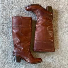 In Great Condition! Highly Sought After! A Womens Size 9. Cognac Tan Leather. I Believe They Are Called Redwood. Not Quite Knee High. Pull On. Gently Worn. There’s A Little Mark On The Back Of The Left Boot At The Top. You Have To Get Close Up To Notice It. I’m Not Sure What It Is But I’m Sure A Cobbler Could Shine Them Up Perfect. There’s No Damage To The Leather. Cognac Leather-lined Boots For Fall, Fall Cognac Boots With Leather Lining, Fall Leather Boots With Leather Backing, Leather Boots With Leather Backing For Fall, Classic Vintage Brown Boots, Cognac Leather-sole Boots For Fall, Cognac Leather Sole Boots For Fall, Cognac Boots With Leather Sole For Fall, Classic Brown Boots With Leather Trim